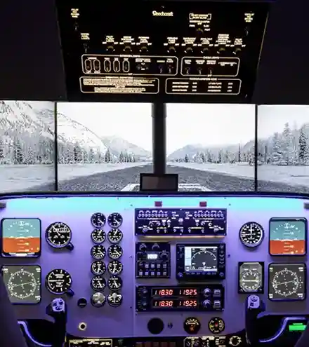 Cockpit view of a small aircraft showing multiple gauges, screens, and controls with a snowy runway visible through the windshield ahead.